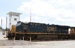 CSX 967 poses beside the yard tower